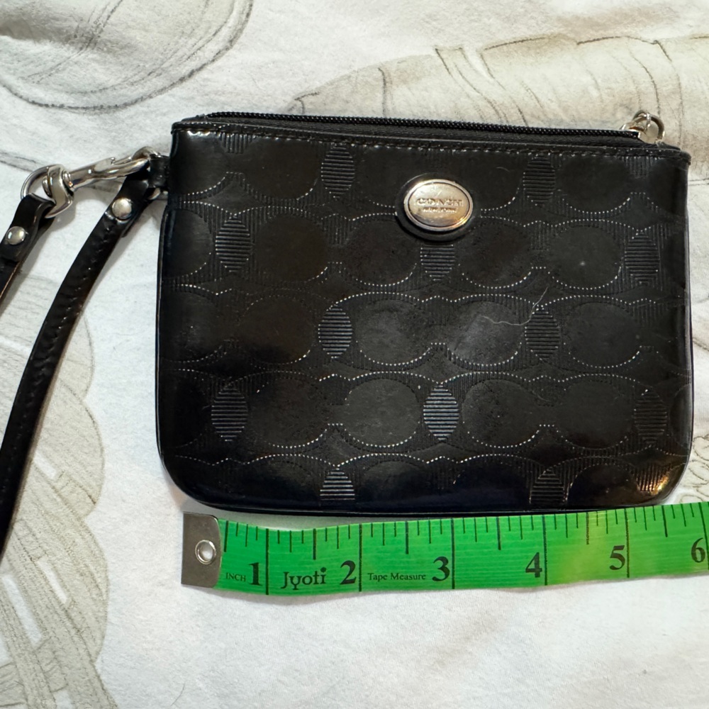 Coach Classic Black Wristlet with Embossed Pattern